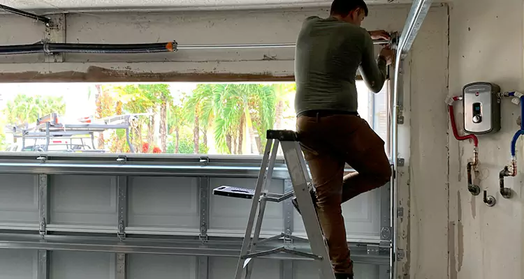Garage Door Tension Spring Replacement in Ensley, FL